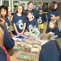  STEAM summer camp students gather around the table for a group activity at Council Rock Elementary.